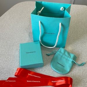 Tiffany & Co. Bag, box, and duster bag with special Warhol red ribbon!